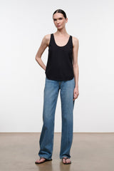 Black sleeveless tank top with scoop neckline, hip-length