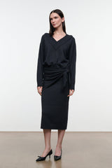 Charcoal V-neck sweater dress with long sleeves and knotted waist detail, midi