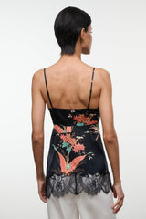 Noir silk camisole top with floral print and lace back hem, adjustable spaghetti straps