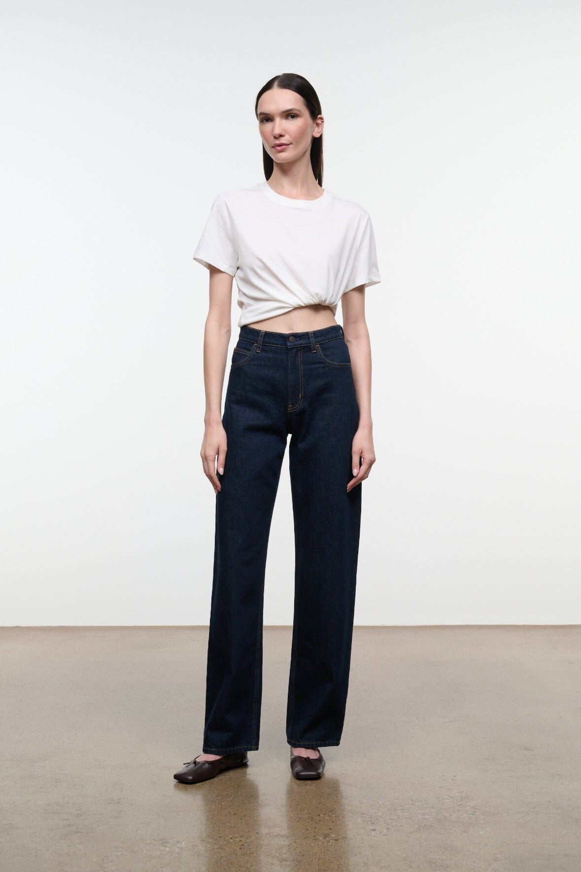 LEO high-rise indigo jeans, straight wide-leg fit with button fly