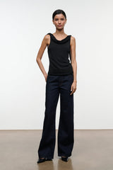Black sleeveless cowl-neck top with fitted drape and straight hem