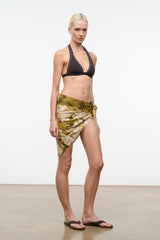 Silk scarf, olive-and-gold abstract print, tied as waist wrap with long drape