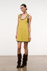 Brown suede slouch boots with stacked heel and ruched shaft on model