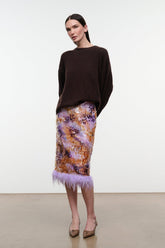 Galaxy print midi pencil skirt with lavender feathered hem, standing full view