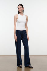 Women's dark navy striped wide-leg jeans, full-body view with pull-on waistband and long legs