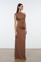 Women's draped one-shoulder maxi dress in warm brown, side view with gathered detail.