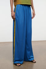 Blue wide-leg pants with elastic waist and yellow side stripe, full length