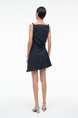 Black sleeveless mini dress with draped bodice and fitted waist, back view