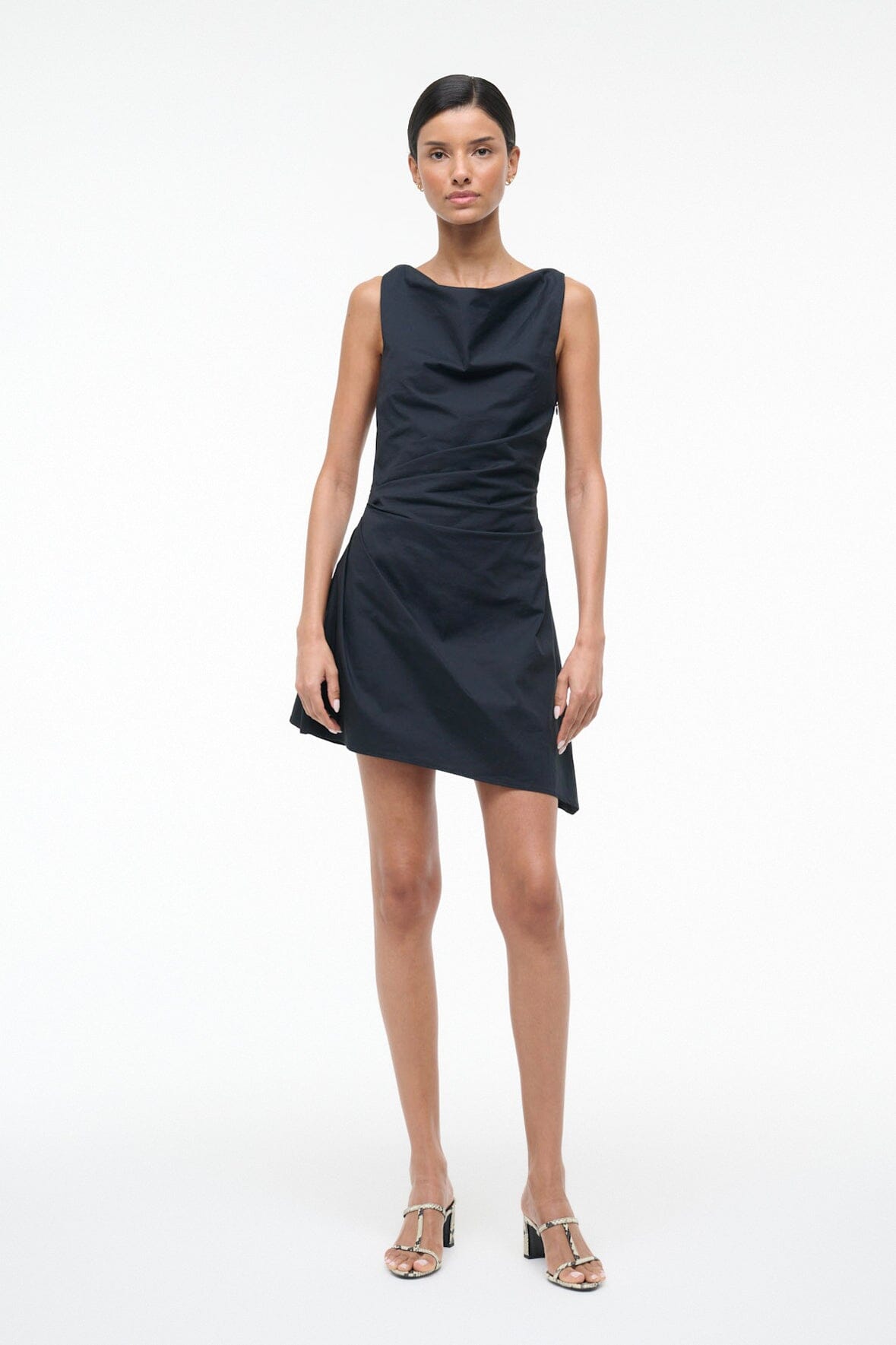 Black sleeveless mini dress with draped bodice and fitted waist, front view