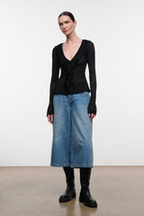 Black long-sleeve V-neck top with ruffled front and peplum hem