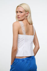 White sleeveless top with lace racerback and pintuck bodice