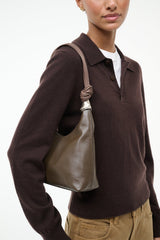 Truffle brown shoulder bag with braided strap, knotted cuff handle, slouchy shape