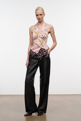 Pink silk halter top with multi-color print, draped neckline and ruffled hem