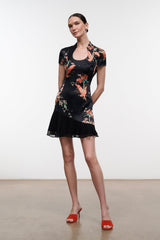 Black silk mini dress with short sleeves and colorful floral bird print, flared hem