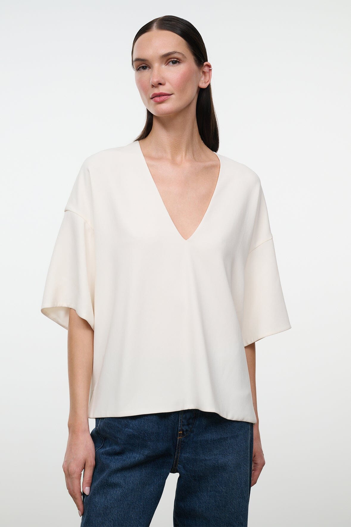 Ivory V-neck short-sleeve tee with relaxed, draped fit