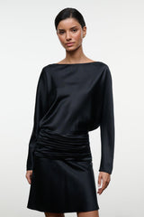 Black silk mini dress close-up, long sleeves and ruched waist gathering