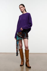 Relaxed cashmere crewneck sweater in deep purple, loose fit, long sleeves.