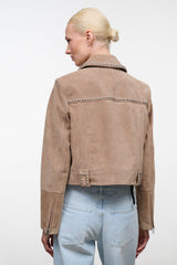 Tan suede jacket, studded trim, back yoke zipper, and flap pockets.