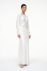 Ivory silk midi dress with long sleeves and ruched waist, side view