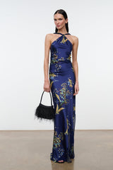 Dark blue silk halter maxi dress with gold tapestry print and tied neckline