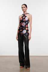 Silk halter top with black base and multicolor circular print, gathered waist