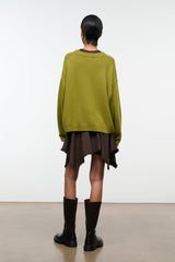 Dark brown skirt back view with uneven hem and frayed trim