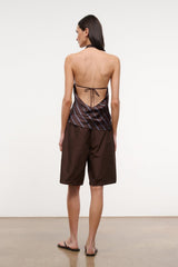 Dark brown bermuda shorts, back view, elastic waist with gathered detail