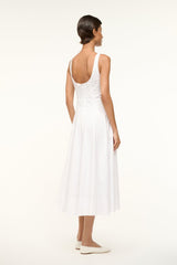 White sleeveless midi dress with open back and thin straps