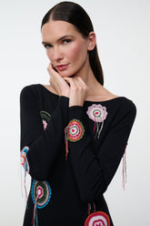 Black long-sleeve dress with colorful dreamcatcher embroidery, round neckline