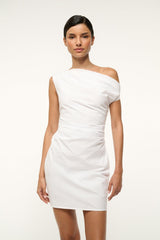 White mini dress with asymmetrical off-shoulder neckline, fitted waist