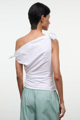 White one-shoulder draped top with bow-tied strap detail, back view