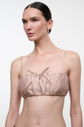 Sandrose silk bandeau top with bow detail, spaghetti straps, and ruched bust