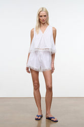 White lace-trim shorts with scalloped eyelet hem, front view
