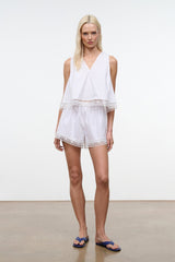 White lace-trim shorts with scalloped eyelet hem, front view