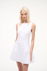 White sleeveless mini dress with round neck and fitted waist seam details