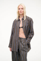 Dark vertical stripe button-up top, long sleeves, front placket and collar
