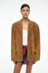 Tan suede jacket with notched lapels and buttoned patch pockets
