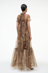 Back view of brown vintage floral sheer maxi dress with high neck and tiered ruffle hem