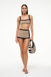 Women’s taupe swim skirt with black trim hem and layered swim style