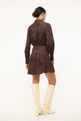 Dark brown mini dress back view, long sleeves and gathered ruffle hem
