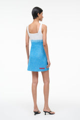 Blue sequined mini dress, scoop back, sleeveless white straps, shark graphic hem