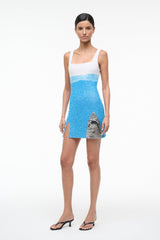 Blue sequined mini dress with white square neckline, sleeveless, shark graphic at hem