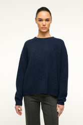 Navy cashmere relaxed crewneck sweater front view with crew neck and cuffs