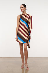 Sleeveless striped silk dress with asymmetrical poncho-style drape and blue trim