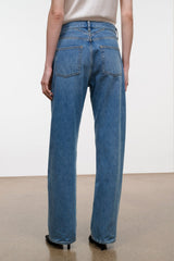 Medium-wash boyfriend jeans with two back patch pockets and belt loops