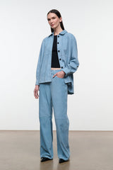 Sky-blue suede shirt with point collar, button front, long sleeves, chest patch pockets