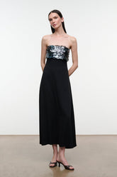 Black strapless midi dress with silver sequined bustier panel and straight skirt