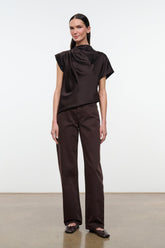 High-rise dark brown jeans with front pockets and relaxed straight fit