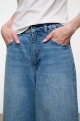 Light blue denim culotte jeans with belt loops and side patch pockets