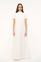 White mock-neck midi dress with short sleeves and clean straight front